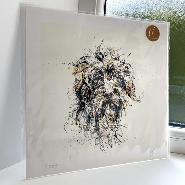 A print of Slippers by Kathryn Callaghan, which features a scruffy dog's face. The 30cm print is presented flat in a clear cello bag with a golden KC sticker in the top right.