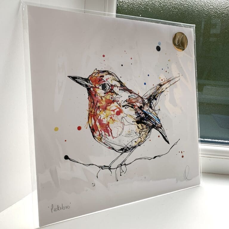 A print of Peekaboo by Kathryn Callaghan, which features a perched robin. The 30cm print is presented flat in a clear cello bag with a golden KC sticker in the top right.