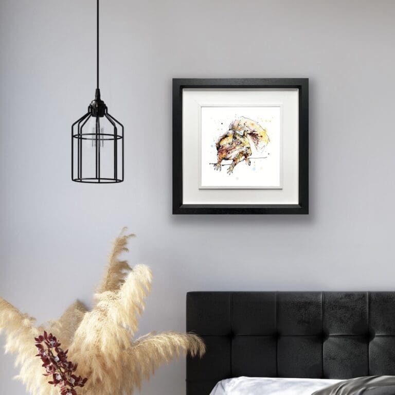 Get Set, Go! Red Squirrel Print shown in Deluxe Black Frame in situ in a bedroom