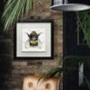 Buzz Bumble Bee Print shown in Deluxe Black Frame in Situ