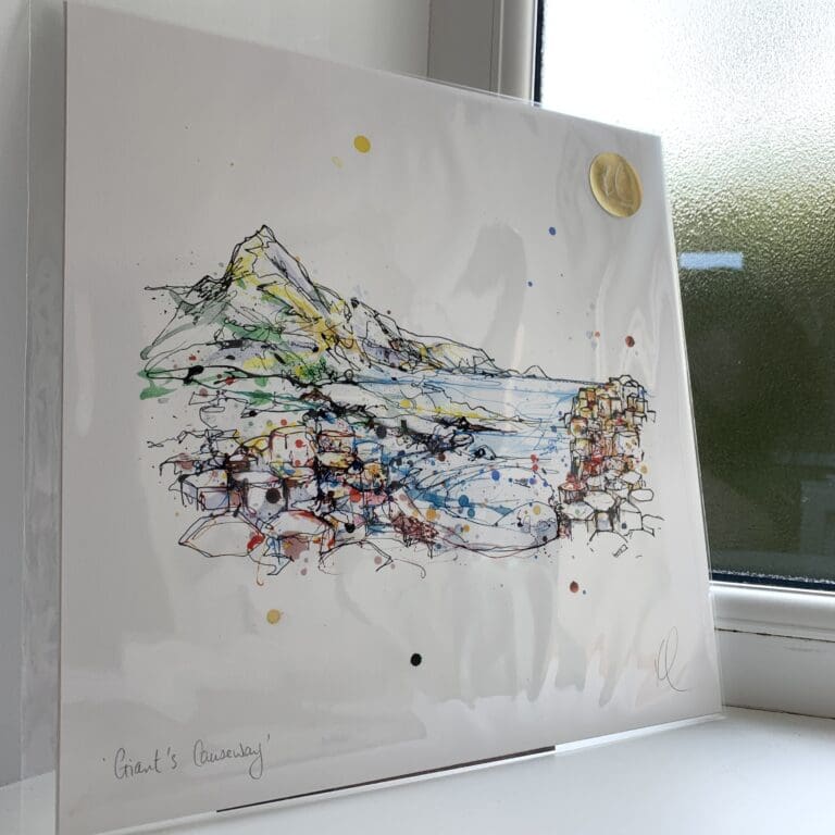 A print of Giants Causeway by Kathryn Callaghan. The 30cm print is presented flat in a clear cello bag with a golden KC sticker in the top right.