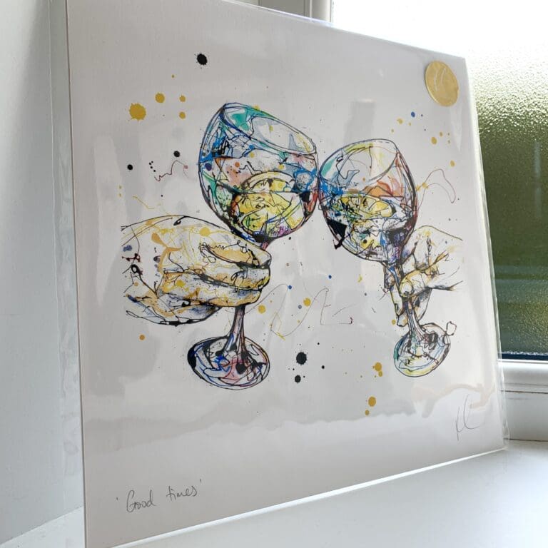 A print of Good Times, which features cheersing gin glasses by Kathryn Callaghan. The 30cm print is presented flat in a clear cello bag with a golden KC sticker in the top right.