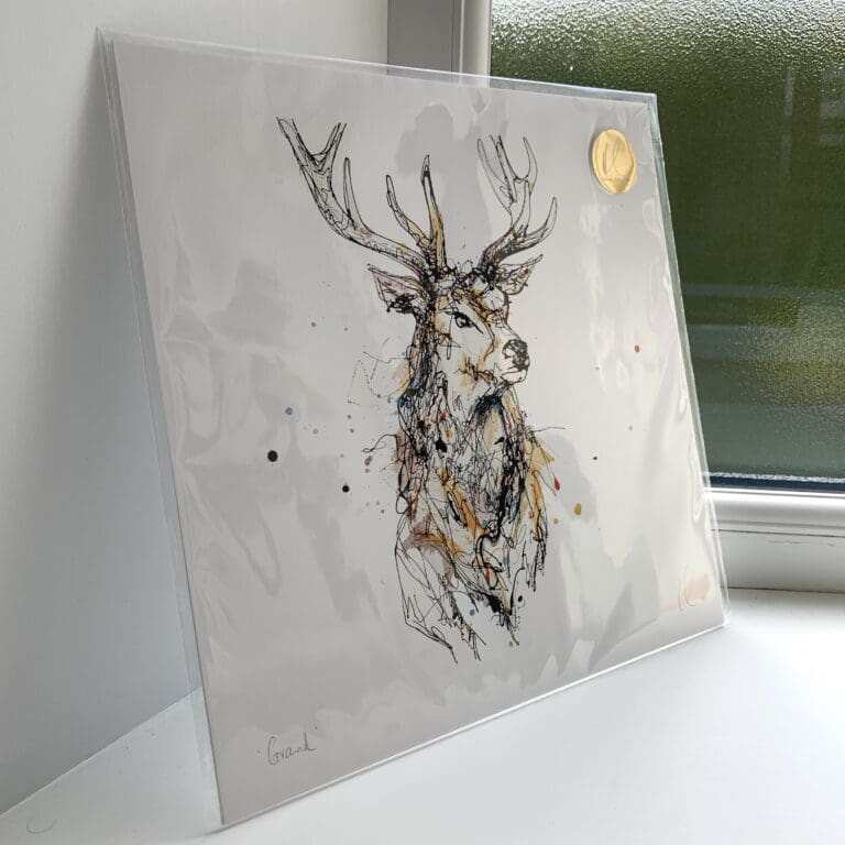 A print of Grand, which features a stag's head and torso by Kathryn Callaghan. The 30cm print is presented flat in a clear cello bag with a golden KC sticker in the top right.