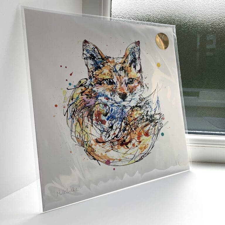 A print of Milkshake by Kathryn Callaghan, which features a fox cub curled up and looking at the viewer. The 30cm print is presented flat in a clear cello bag with a golden KC sticker in the top right.