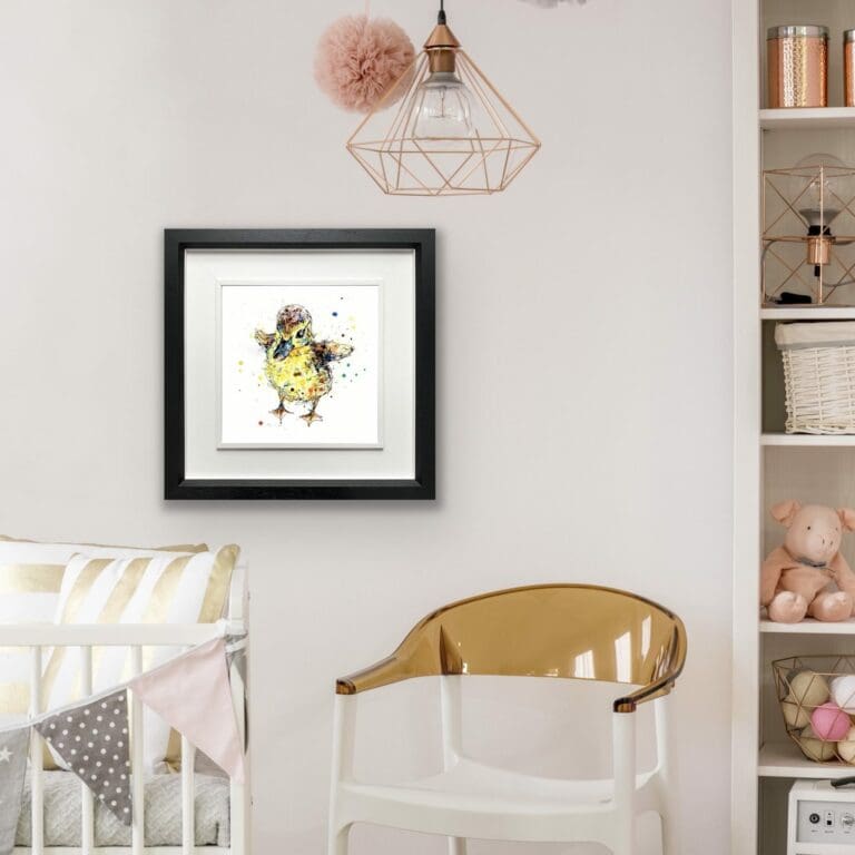 Sherbet Duckling Print shown in Deluxe Black Frame in Situ in a child's bedroom