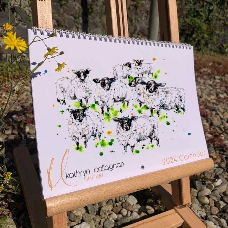 The cover of Kathryn Callaghan's 2024 calendar featuring a print of a flock of black-faced sheep on the cover. Kathryn's logo of her signature is in the bottom left corner alongside text reading "Kathryn Callaghan Fine Art". Text in the bottom right corner reads "2024 Calendar".