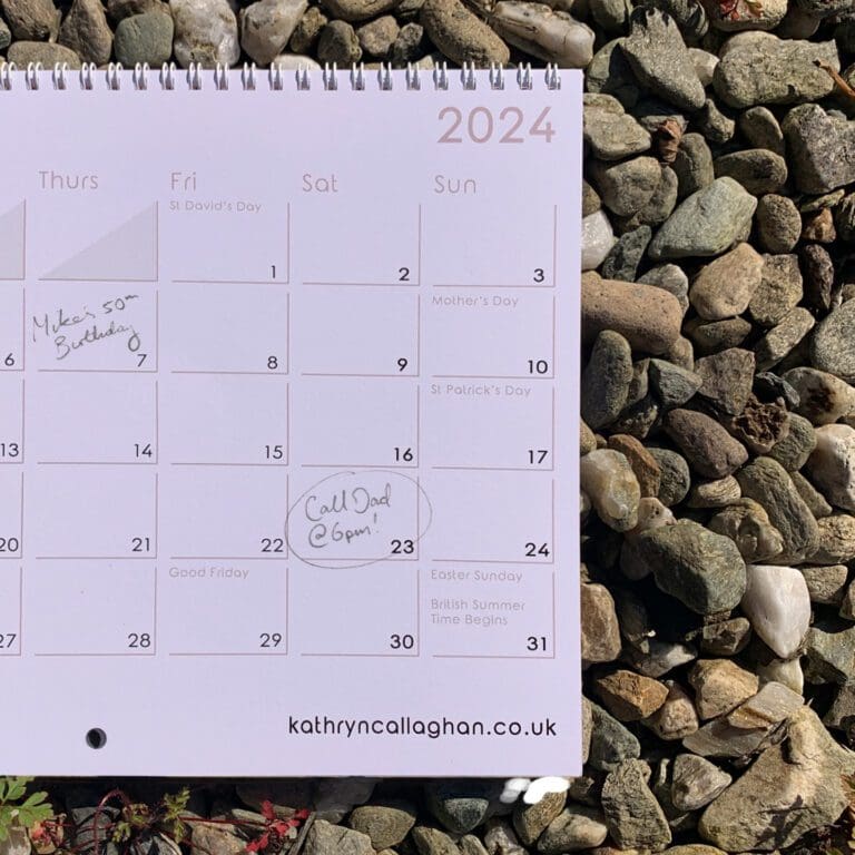 The month grid for March in the 2024 Kathryn Callaghan Fine Art Calendar, showing some of March's public holidays and two handwritten notes.