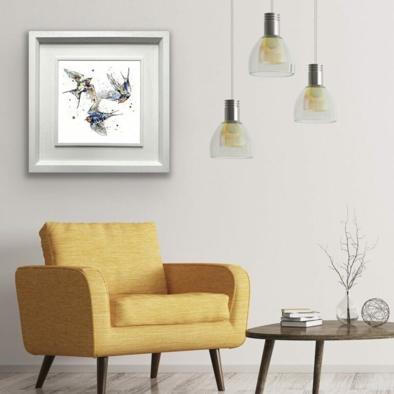 Affinity Three Swallows Print shown in Deluxe White Frame in Situ with Yellow Chair