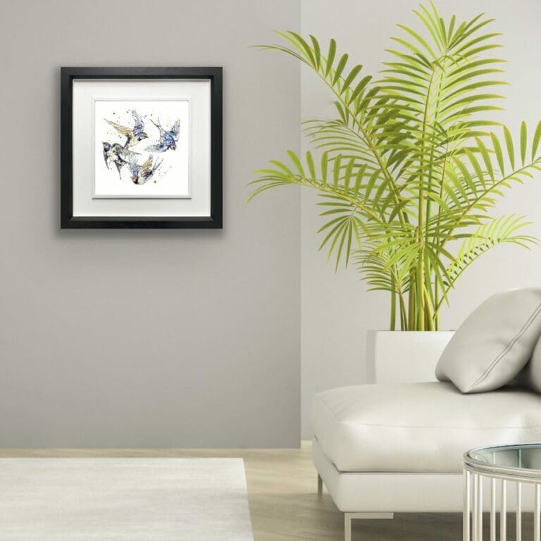 Belonging Four Swallows Print shown in Deluxe Black Frame in Situ alongside houseplant