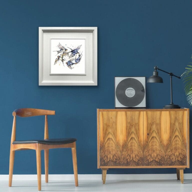 Closeness Five Swallows Print shown in Deluxe White Frame in Situ on blue wall