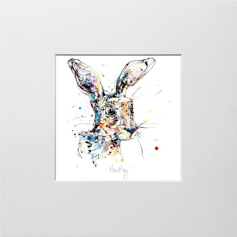 A digital mockup showing how a miniature print of Hartley by Kathryn Callaghan will look presented in a 23cm mount. Hartley features a cheerful hare's face.