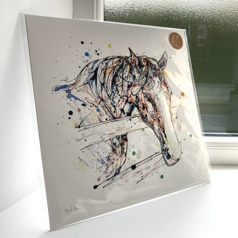 A print of Hudson by Kathryn Callaghan, which features a farmyard horse looking over a fence. The 30cm print is presented flat in a clear cello bag with a golden KC sticker in the top right.