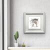 Hudson horse print shown in deluxe white frame in situ