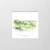 A digital mockup showing how a miniature print of Calamity Corner by Kathryn Callaghan will look presented in a 23cm mount. The print portrays the 16th hole at Royal Portrush Golf Club.