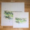 Two prints of Calamity Corner, a Royal County Down Gold Course print by Kathryn Callaghan, to show the size difference between the 45cm print and the 30cm print.