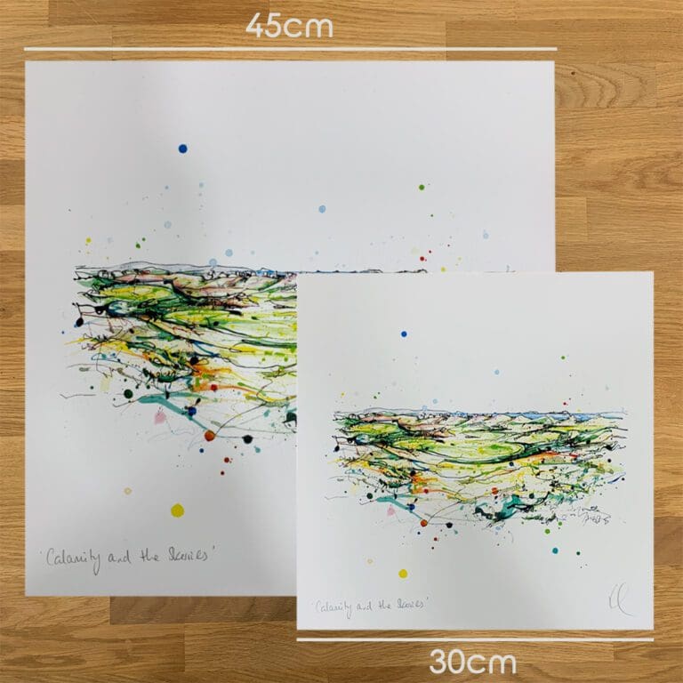 Two prints of Calamity Corner & The Skerries, a Royal County Down Gold Course print by Kathryn Callaghan, to show the size difference between the 45cm print and the 30cm print.