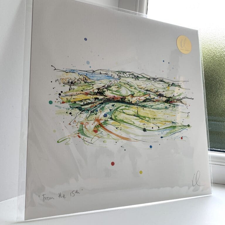 A print of From the 15th by Kathryn Callaghan, which portrays the view from the 15th hole of Royal Portrush Golf Club. The 30cm print is presented flat in a clear cello bag with a golden KC sticker in the top right.