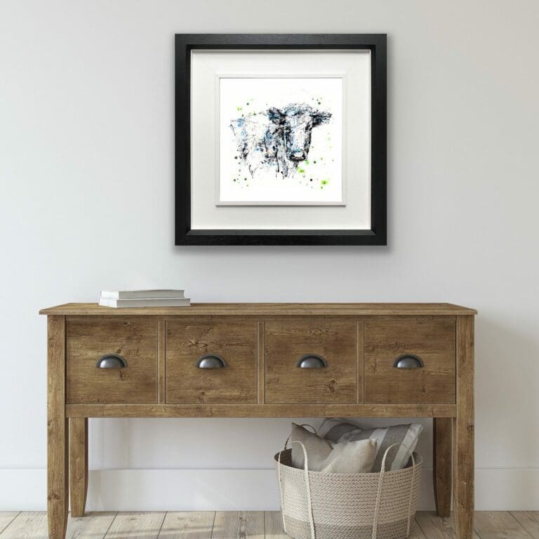 Pastures New Fresian Cow Paper Giclee Fine Art Print shown in Deluxe Black Frame in Situ