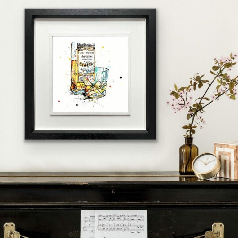 A Wee Night Cap Whiskey Print displayed in Deluxe Black Frame in Situ