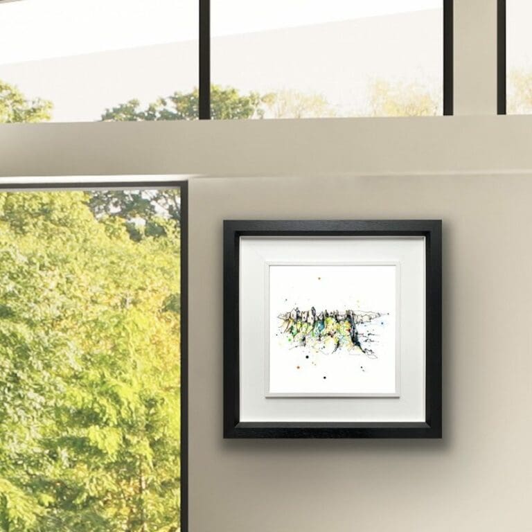 Dunluce Castle Northern Ireland print shown in Deluxe Black Frame in Situ beside windows