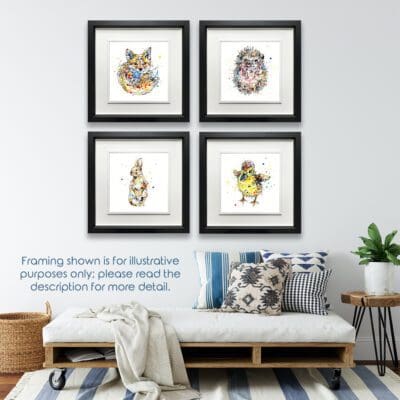 Four prints in deluxe black frames hang in a grid in a white walled room above a futon. The prints are a fox cub called Milkshake, a hedgehog called Pickles, a baby bunny rabbit called Pumpkin, and a duckling called Sherbet.