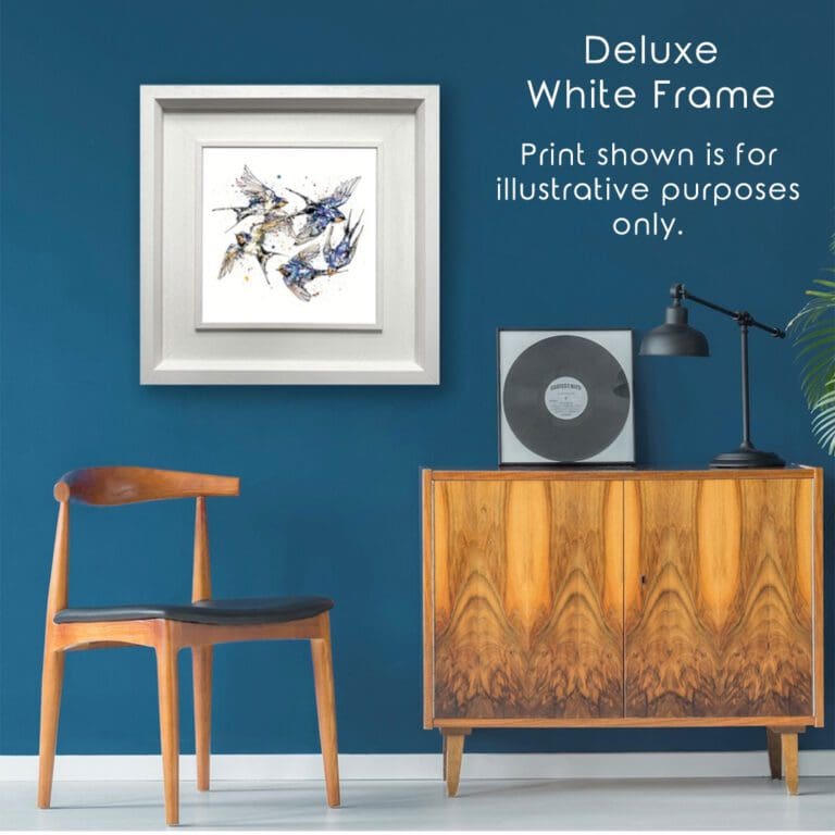 Swallows Print Belonging hung in Deluxe White Frame in Situ on blue wall alongside teak sideboard and chair