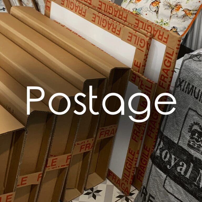 A collection of boxes and flat packages alongside a grey Royal Mail post bag with the word Postage in clear white text over top.