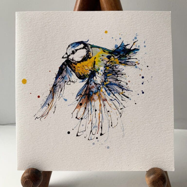 Greetings card featuring Coat of Colour, a poured painting of a blue tit in flight by Kathryn Callaghan.