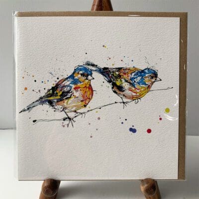 Greetings card featuring a poured painting of two chaffinches by Kathryn Callaghan. A sticker on the card reads "The Eco Friendly Card Company".