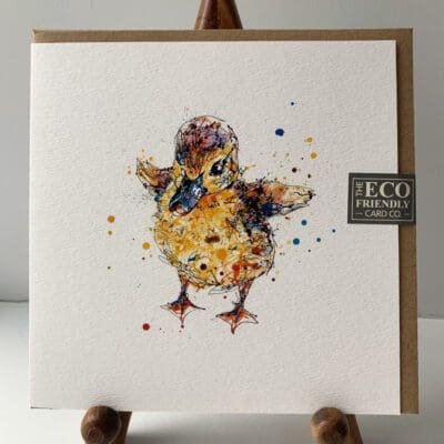 Greetings card featuring a poured painting of a duckling by Kathryn Callaghan. A sticker on the card reads "The Eco Friendly Card Company".