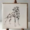 Greetings card featuring a poured painting of a dalmatian by Kathryn Callaghan. A sticker on the card reads "The Eco Friendly Card Company".