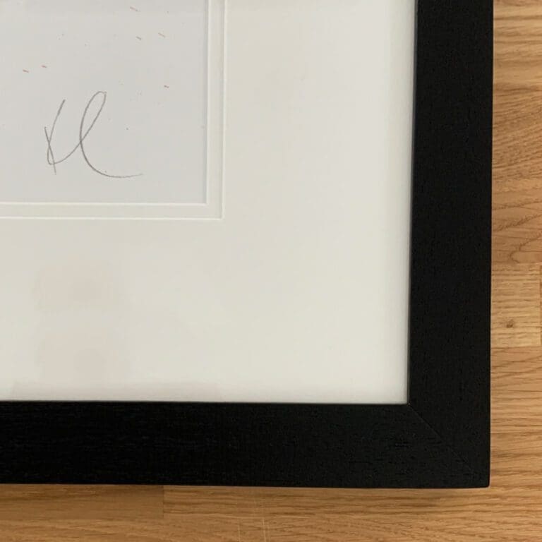 Close up image showing the signature, double hayseed mount, and black box framed used on Majestic