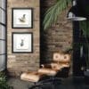 A pheasant print and a stag print by Kathryn Callaghan shown in a trendy exposed brick office.