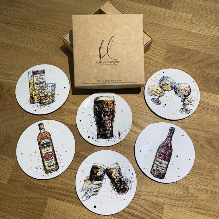 A set of six coasters featuring prints of iconic drinks by Kathryn Callaghan, including Guinness, Bushmills Irish Whiskey, Gin, and Red Wine.