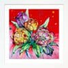 Love, a print of pink, orange, and magenta tulips against a vibrant red background by Kathryn Callaghan, shown in a standard white frame.