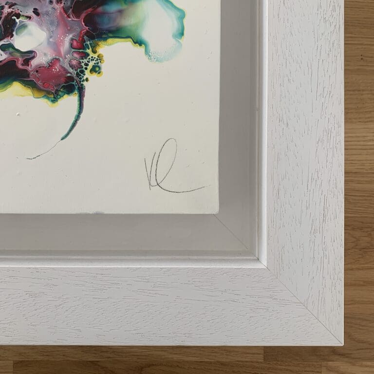 A close up photograph of the pencil signature and thick white floating tray frame surrounding Always, an original abstract painting by Kathryn Callaghan.