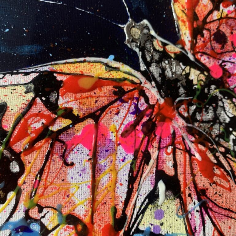Close up photograph showing the use of texture and colour in 'Into the Light', an original painting of a butterfly by Kathryn Callaghan.