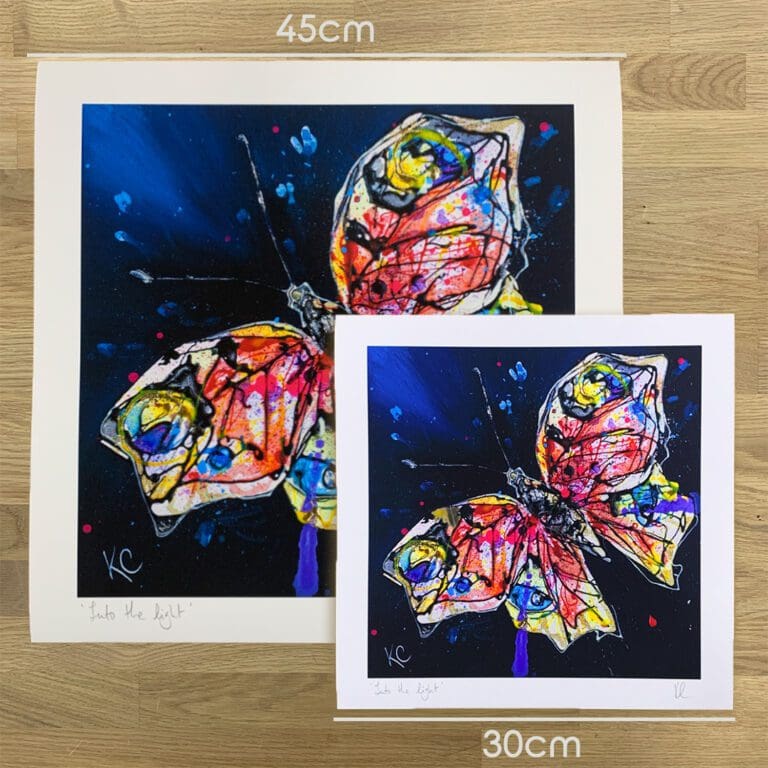Two prints of Into the Light, a butterfly print by Kathryn Callaghan, to show the size difference between the 45cm print and the 30cm print.