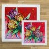 Two prints of Love, a floral print by Kathryn Callaghan, to show the size difference between the 45cm print and the 30cm print.