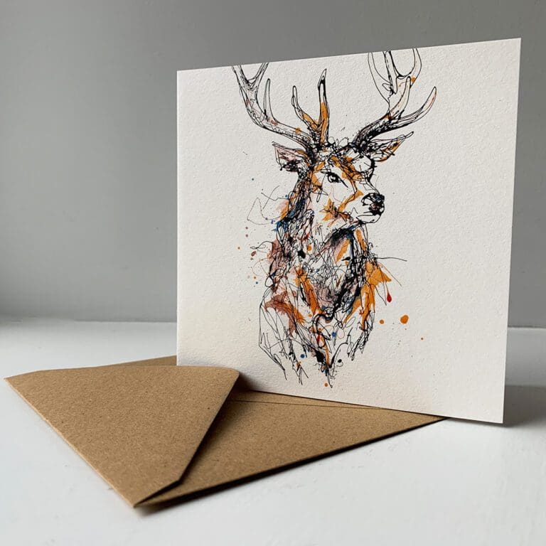 A greetings card by Kathryn Callaghan featuring Grand, a print of a handsome stag's head, sitting alongside its brown paper envelope.