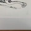 A print of The Púca by Kathryn Callaghan shown in a double mount with the artist's signature in pencil.