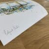 Photograph of Belfast Docks by Kathryn Callaghan, which shows the print's title handwritten in the bottom left corner and the artist's signature in the bottom right, with space between to add a custom personalisation.