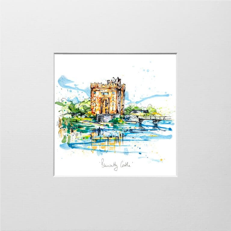 A digital mockup showing how a miniature print of Bunratty Castle by Kathryn Callaghan will look presented in a 23cm mount. Bunratty Castle features the eponymous castle lit in golden light above the blue Bunratty river.