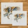 Two prints of Hover by Kathryn Callaghan, a print of a barn owl in flight, to show the size difference between the 45cm print and the 30cm print.