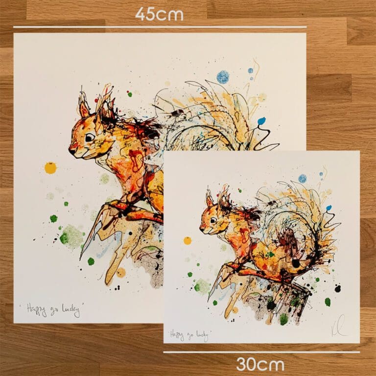 Two prints of Happy Go Lucky Kathryn Callaghan to show the size difference between the 45cm print and the 30cm print.