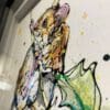 Close up detail of Just Hanging Around, an original mouse painting, to show the texture and detail of ink and gel on the surface, and the use of gold and silver leaf.