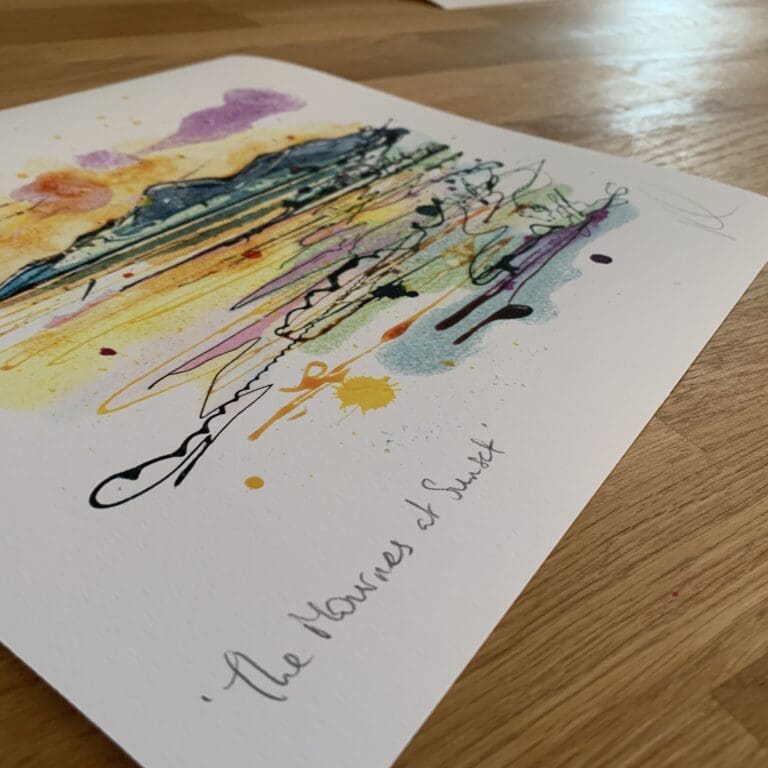 Photograph of The Mournes at Sunset by Kathryn Callaghan which shows the print's title handwritten in the bottom left corner and the artist's signature in the bottom right, with space between to add a custom personalisation.