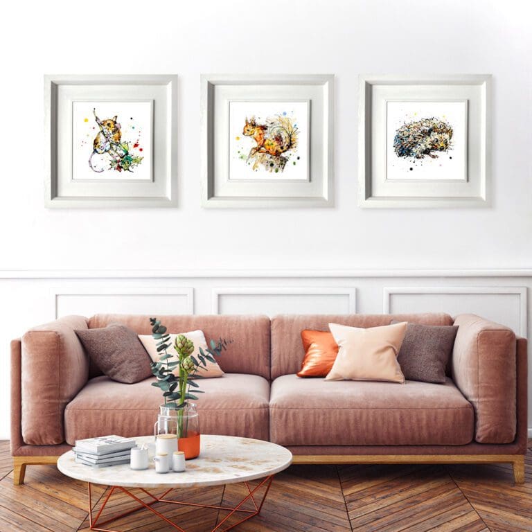 Just Hanging Around, Happy Go Lucky, and Tiny Steps, three prints by Kathryn Callaghan, shown in Deluxe White Frames in Situ