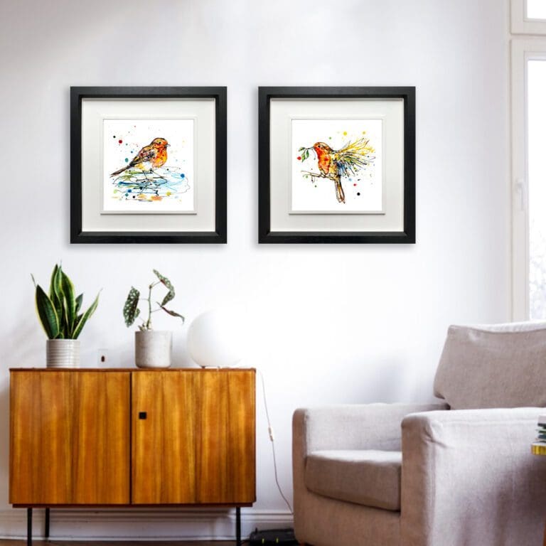 Reflect and I'm Home, two robin prints by Kathryn Callaghan, shown in Deluxe Black Frames in Situ.