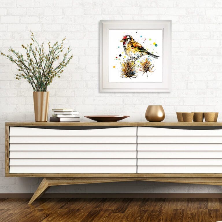 Sundown, a 45cm goldfinch print by Kathryn Callaghan, shown in Deluxe White Frame in Situ